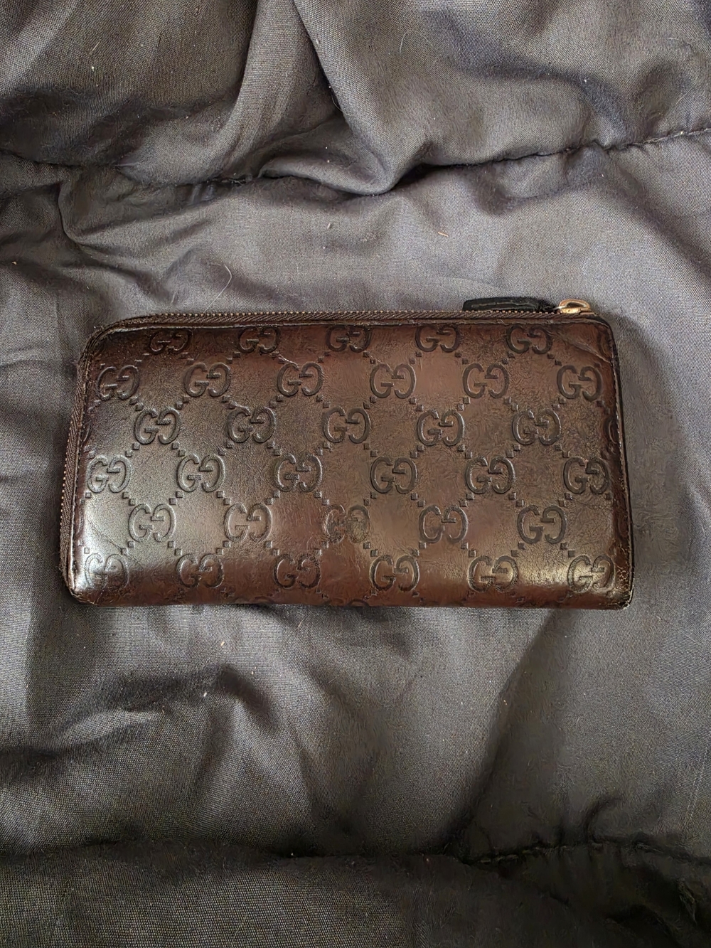 Gucci Brown GG Embossed Leather Zip Wallet